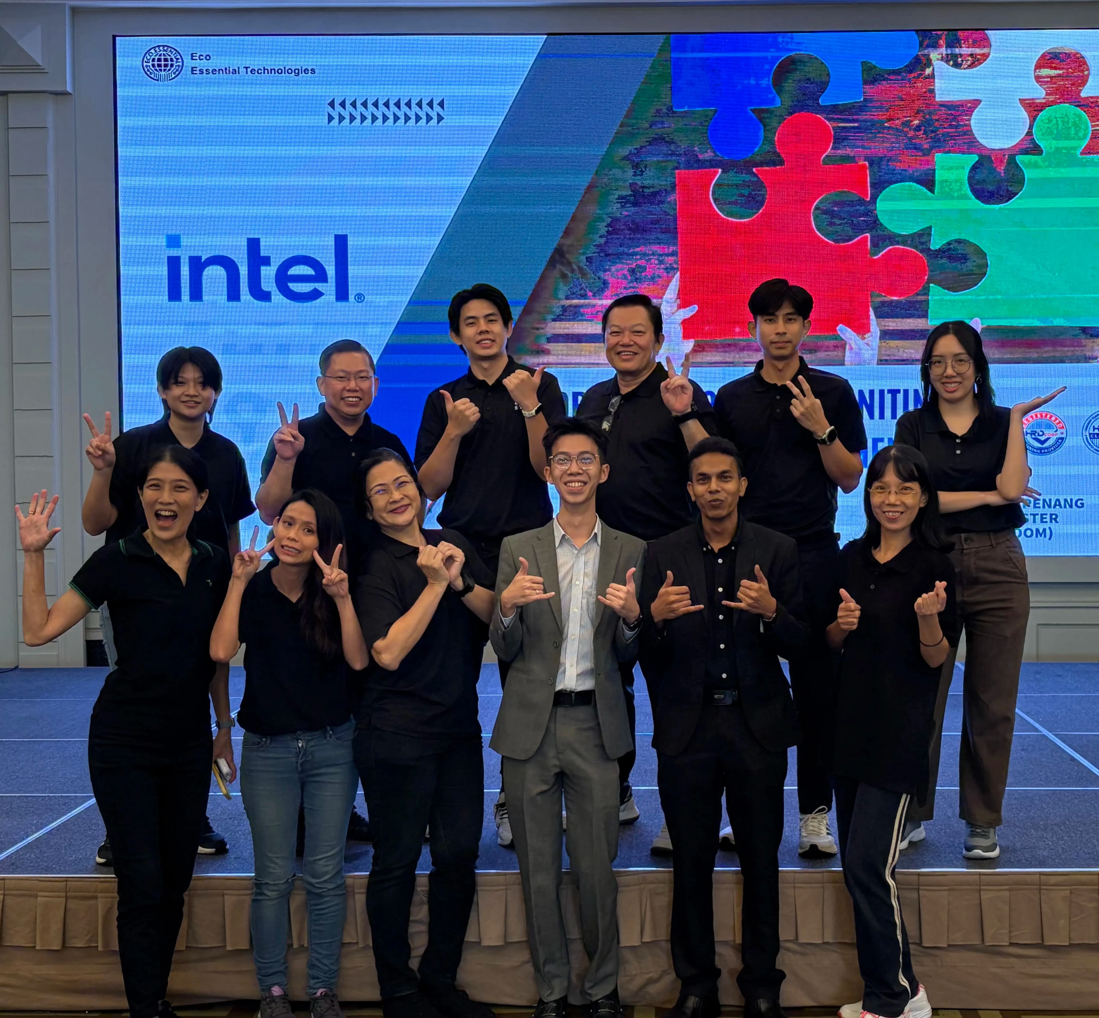 Professional team discussion at Eco Essential Technologies training session showcasing collaborative learning environment